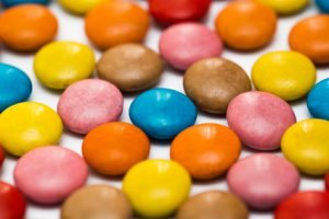 Close up of a pile of colorful chocolate coated candy